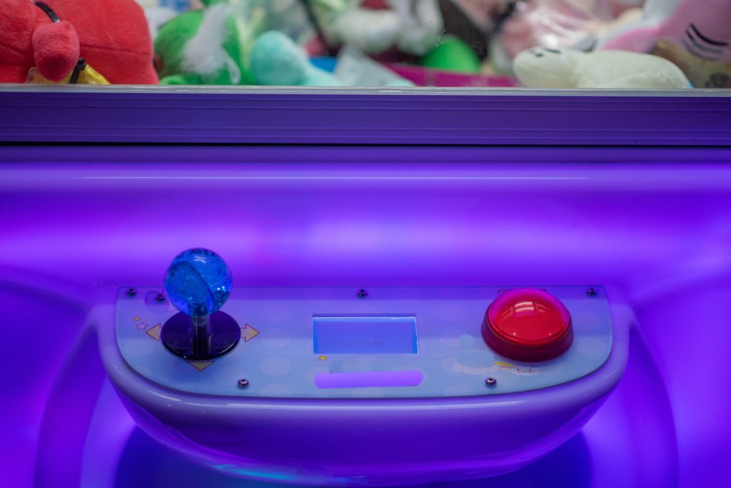 Close up shot of controller on arcade game